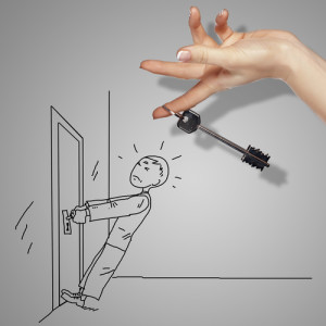 Man tryig to open a door with key